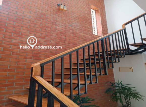 Exposed wall and exposed staircase