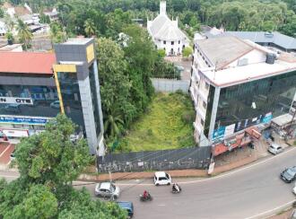 Commercial Land for Sale in Kottayam, Kaduthuruthy, Kaduthuruthy, Near by building - Kanivelil shopping complex