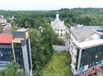 Commercial Land for Sale in Kottayam, Kaduthuruthy, Kaduthuruthy, Near by building - Kanivelil shopping complex