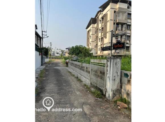 Main gate leading to one acre compound